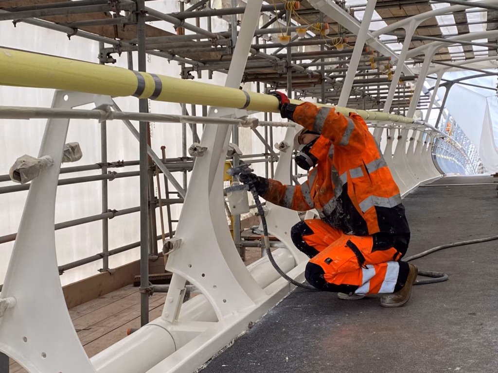 specialist access maintenance - industrial coating applied to a bridge
